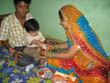 jaipur tour, a lady tying rakhi on the wrist of her brother