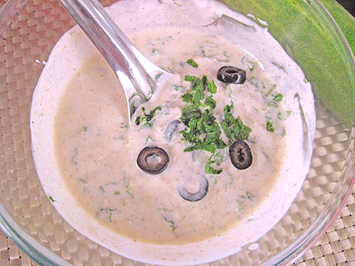 Adding of all the vegetables in curd