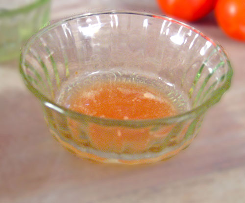 Combination of tomato juice and coconut oil