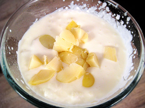 Adding of boiled and chopped potatos in the yogurt