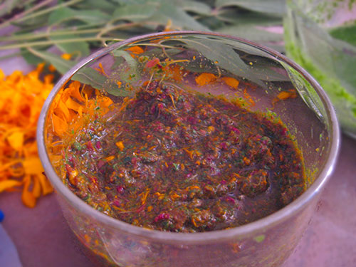 Face pack of rose and marigold flowers