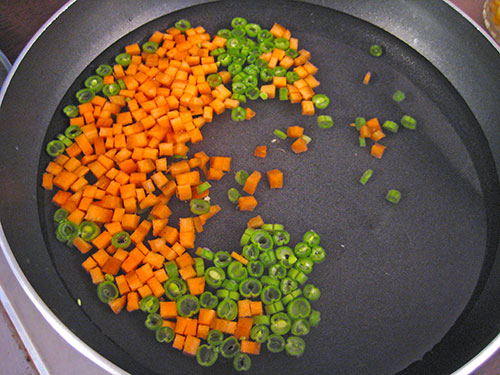 Boiling of french beans and carrots