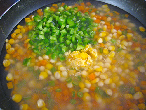 Adding of mashed corn and chopped capsicum